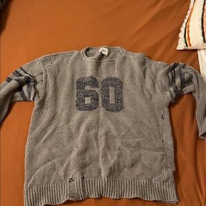 Distressed BDG varsity sweater size S